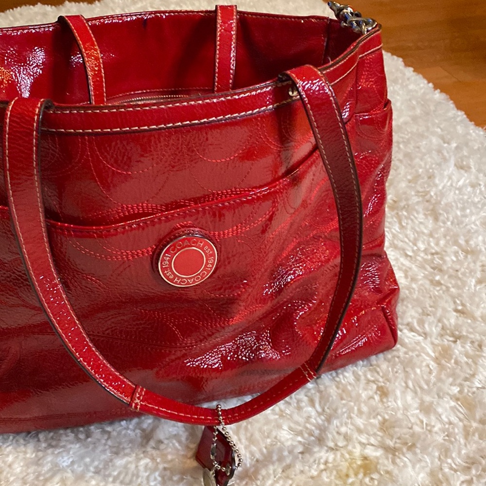Coach red patent leather tote 19”x 11”x 6” Pink satin inside,beautiful!